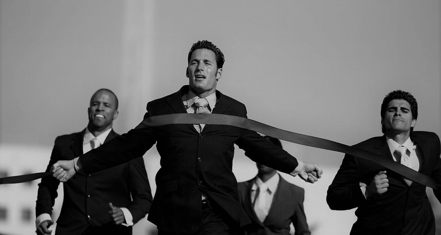 Businesspeople Running Towards Finish Line --- Image by © Royalty-Free/Corbis