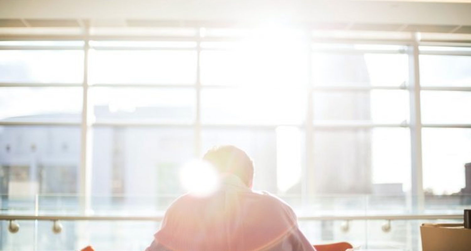 Sitting-in-Office-with-Sun-700x466