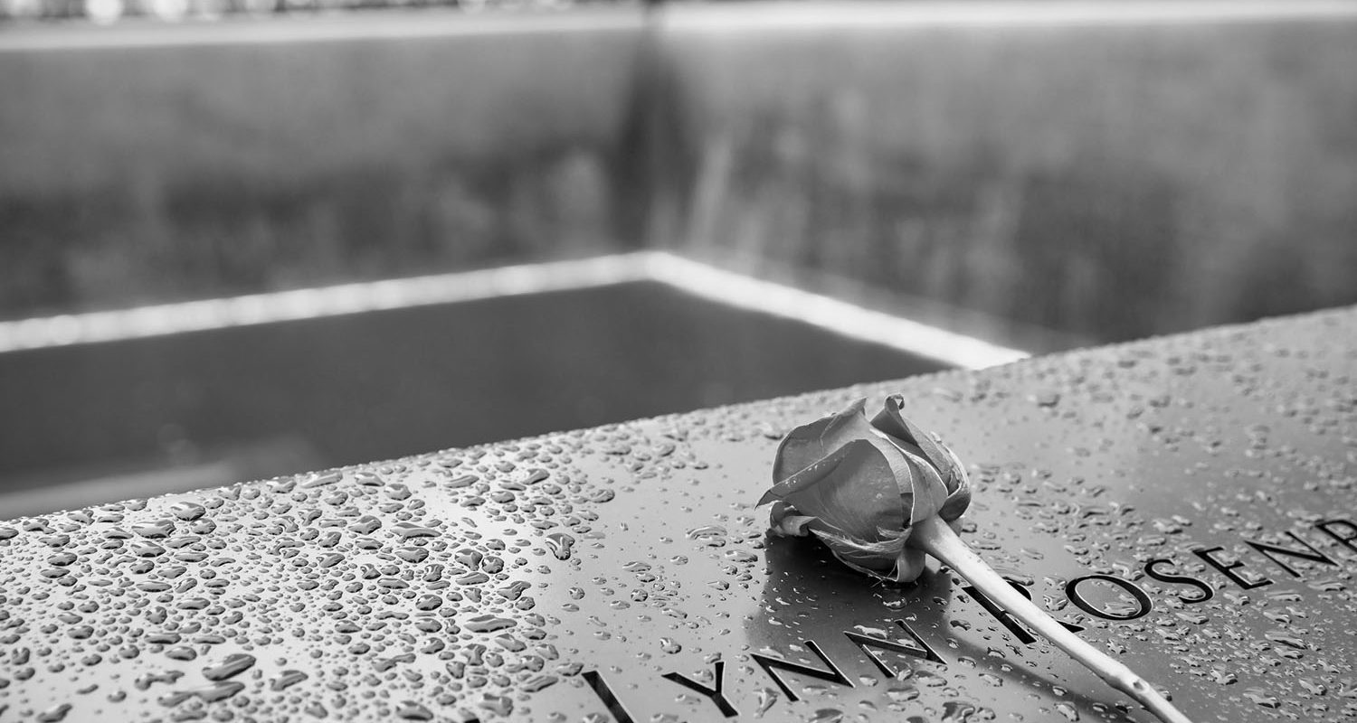 New York City, United States - May 31, 2018: A single red rose of remembrance at the September 11 memorial in New York City