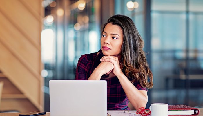 Portrait of burnout businesswoman in an office