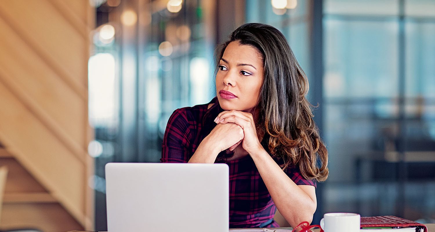 Portrait of burnout businesswoman in an office