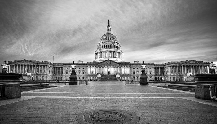 The Capitol Building in Washington, D.C., USA lit up in the early evening.