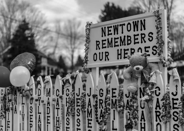 Newtown, USA - December 23, 2012: Sandy Hook Elementary School shooting memorial in Newtown, Connecticut on December 23, 2012 after Sandy Hook Elementary School shooting. The massacre took place on December 14, 2012 when a gunman murdered 20 children and 6 adults staff members.