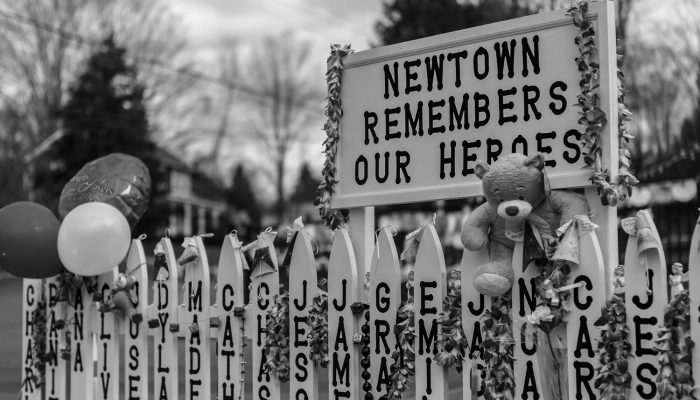 Newtown, USA - December 23, 2012: Sandy Hook Elementary School shooting memorial in Newtown, Connecticut on December 23, 2012 after Sandy Hook Elementary School shooting. The massacre took place on December 14, 2012 when a gunman murdered 20 children and 6 adults staff members.